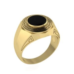 A gold ring with black stone on it's side.