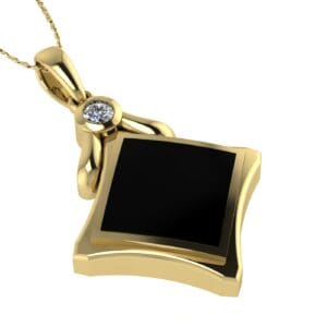 A gold necklace with a black square and diamond.