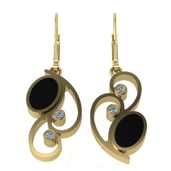 A pair of gold earrings with black and white stones.