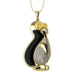 A gold penguin necklace with black and white enamel.