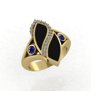 A gold ring with black and blue stones.